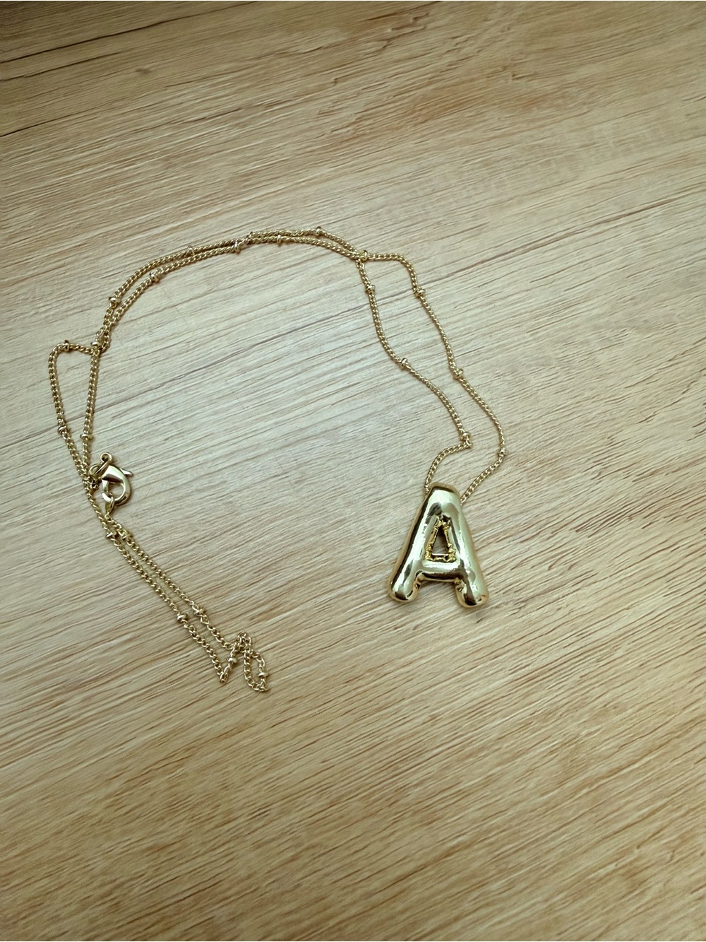 Gold bubble A letter necklace